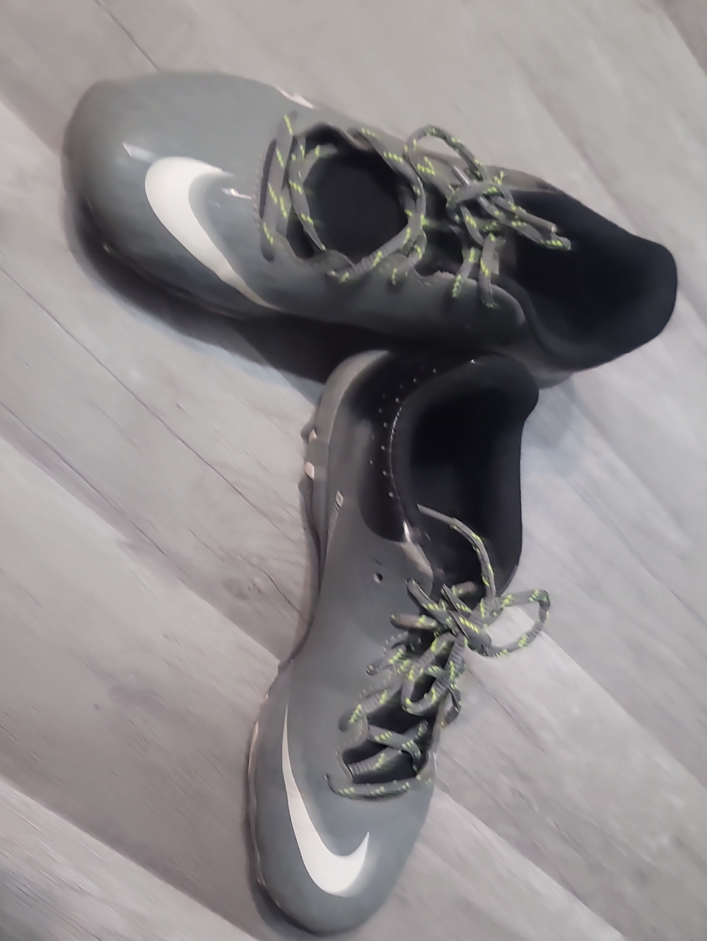Nike Gray Cleetd with White Swoosh and Lime Laces 5Y